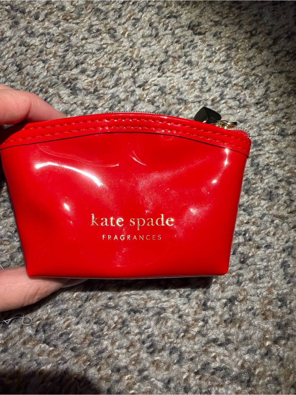 kate spade glossy red cosmetic pouch with gold logo